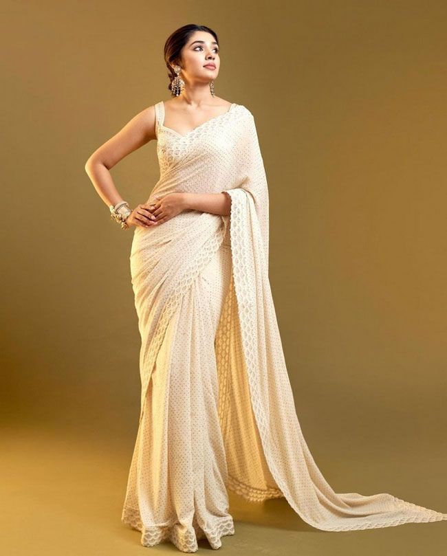 Krithi Shetty Staggering Poses In White Saree